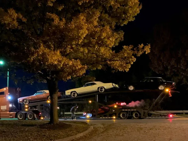 Cars and a work truck stored together inside the Gateway Storage facility