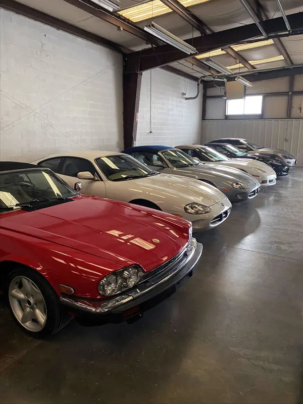 Classic cars parked side by side in indoor storage at Gateway Storage, Lexington KY
