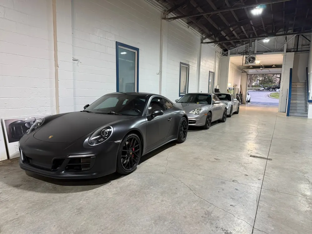 Porsche 911 sports cars parked in a row inside the heated indoor storage building at Gateway Storage in Lexington, Kentucky